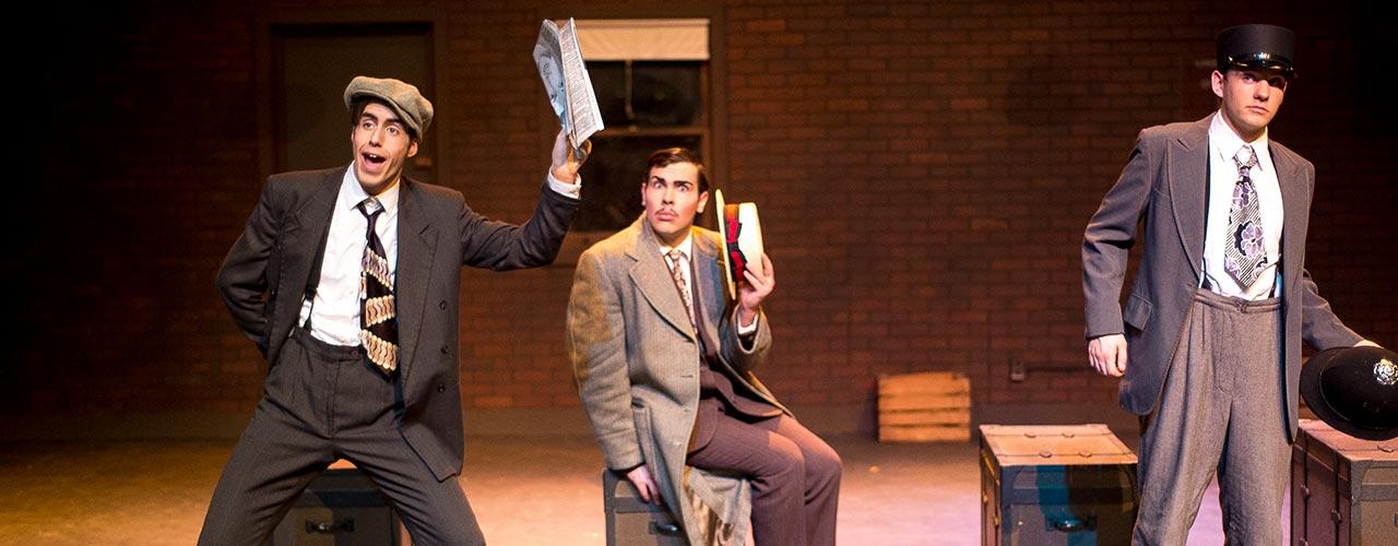 Three male theatre majors act out a scene
